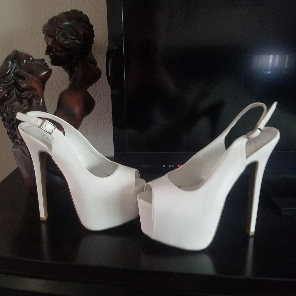 White leather pumps